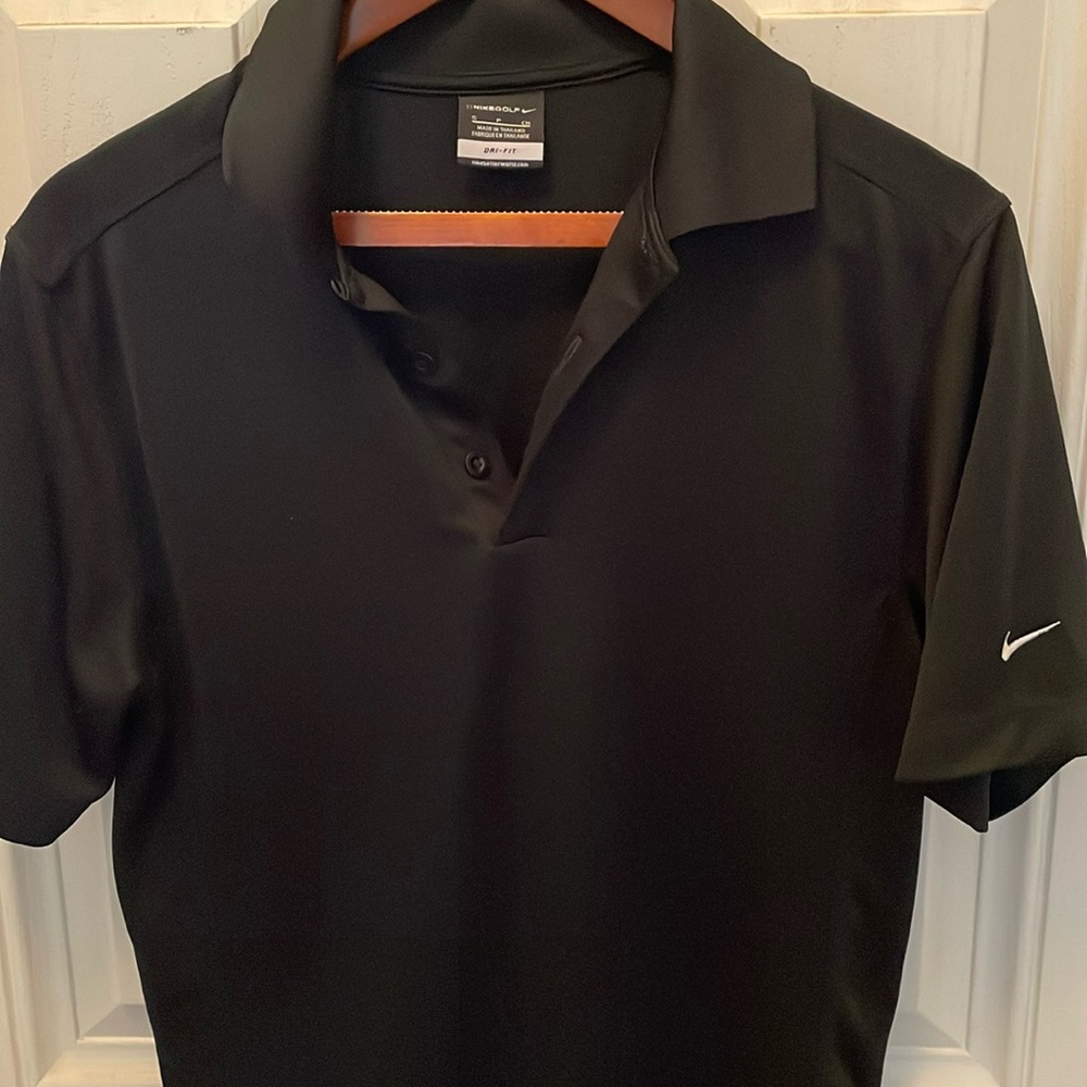 Nike golf dri-fit black three button golf shirt.